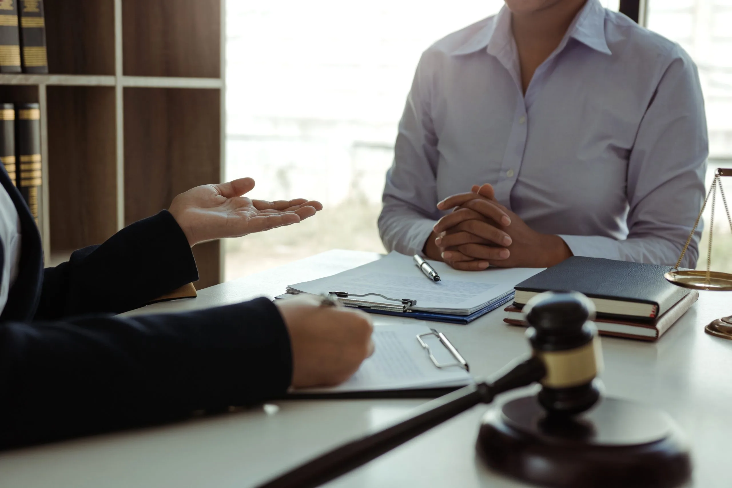 Lawyer is giving advice to clients who have consulted about lega